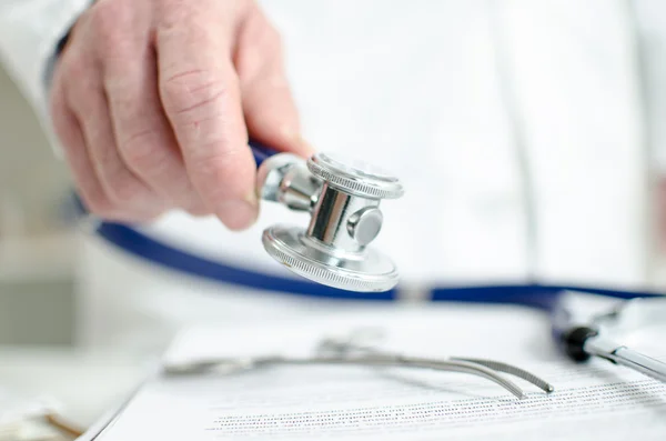 Doctor holding a stethoscope — Stock Photo, Image