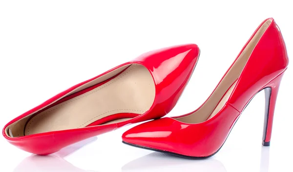 Rote Schuhe mit hohen Absätzen — Stockfoto