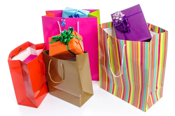 Gifts in paper shopping bags — Stock Photo, Image