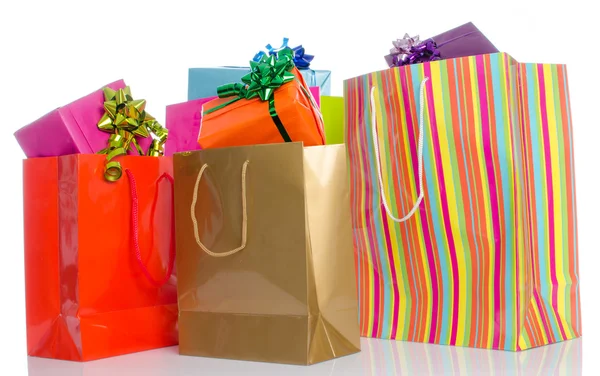 Gifts in paper shopping bags — Stock Photo, Image