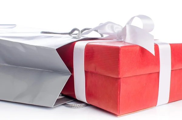 Gift with paper shopping bag — Stock Photo, Image