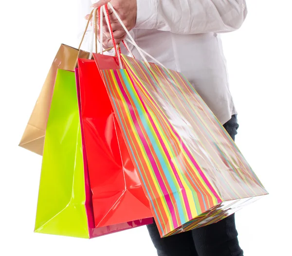 Mulher carregando sacos de compras — Fotografia de Stock