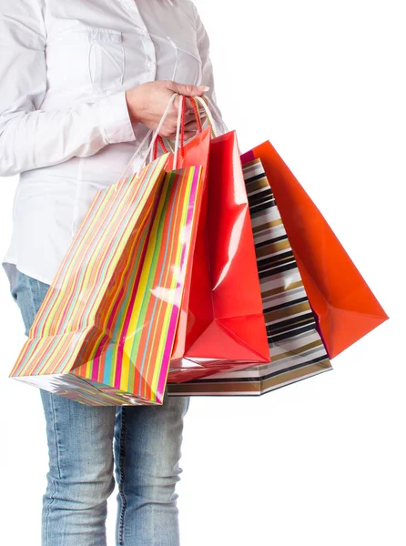 Mulher carregando sacos de compras — Fotografia de Stock