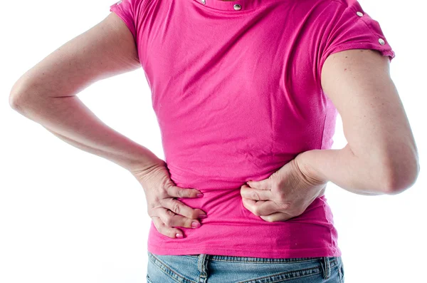 Mulher com dor nas costas — Fotografia de Stock