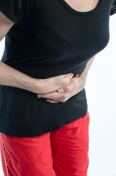 Mujer con dolor de estómago —  Fotos de Stock