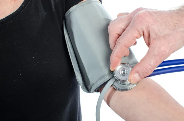 Checking blood pressure — Stock Photo, Image