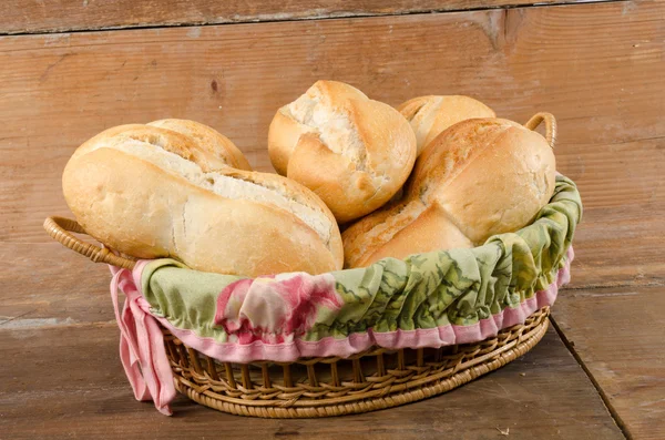 Small breads in a basket — Stock Photo, Image