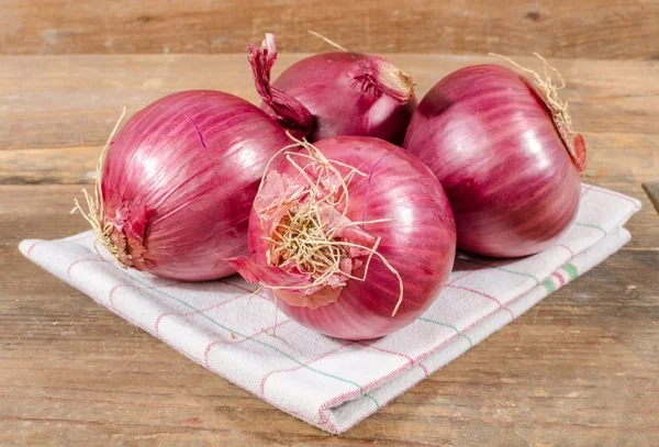 Fresh bulbs of red onions