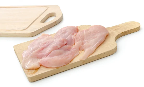 Čerstvé syrové maso na dřevěné desce — Stock fotografie