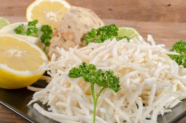 Tasty grated celery on a plate — Stock Photo, Image