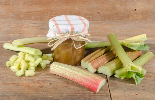 Rhubarb jam jar with fresh rhubarb — Stock Photo, Image