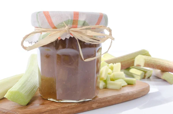 Rhubarb jam jar with fresh rhubarb — Stock Photo, Image