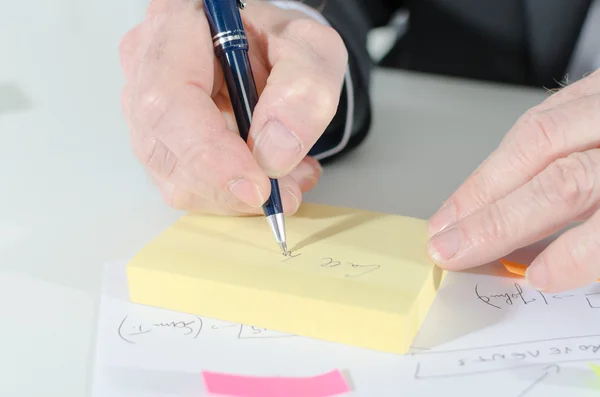 Businessman taking notes — Stock Photo, Image