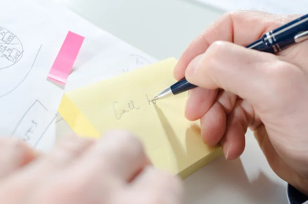 Businessman taking notes — Stock Photo, Image