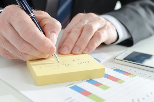 Businessman taking notes — Stock Photo, Image