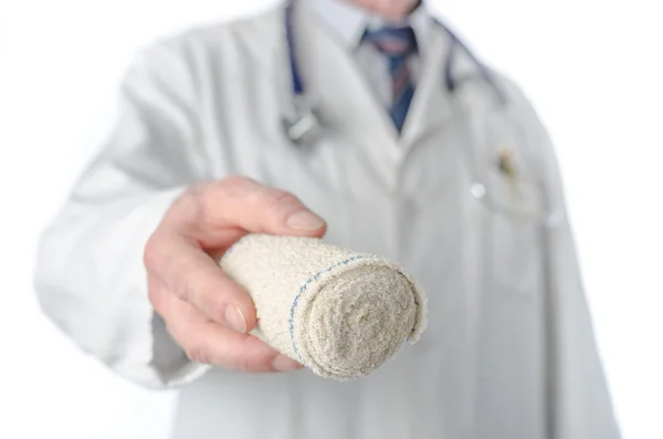 Doctor holding a bandage — Stock Photo, Image