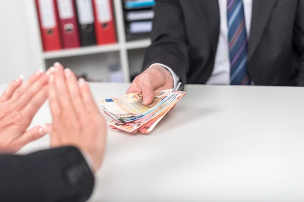 Woman hands rejecting an offer of money — Stock Photo, Image