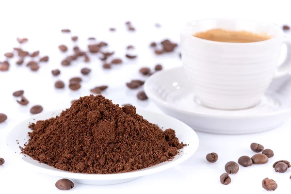 Expresso and coffee powder — Stock Photo, Image