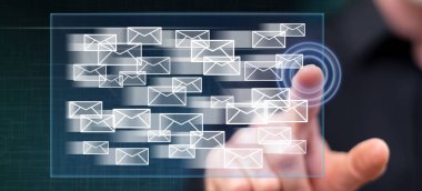 Bir adam dokunmatik ekranda e-posta konseptine parmağıyla dokunuyor.