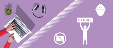 Vuruş kavramının sembolü olan dizüstü bilgisayar kullanan ellerin üst görünümü