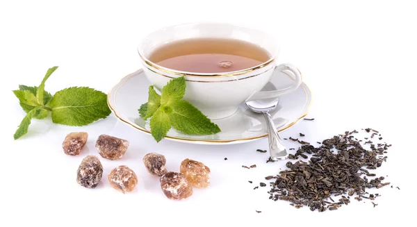 Složení s šálkem čaje a různých přísad — Stock fotografie