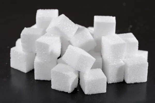 Heap of white sugar cubes — Stock Photo, Image