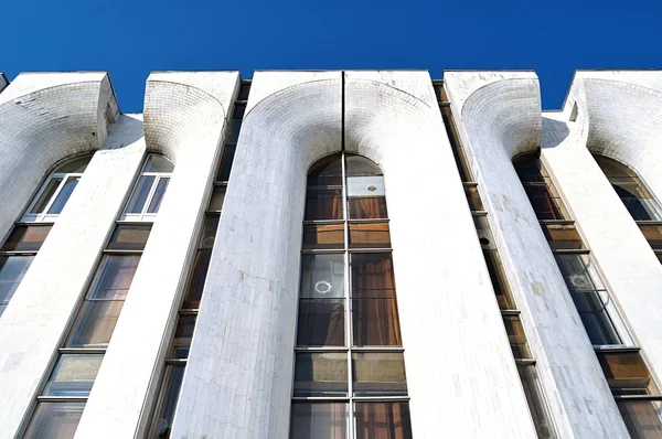 High building of futuristic design made of concrete  - architecture modern background.