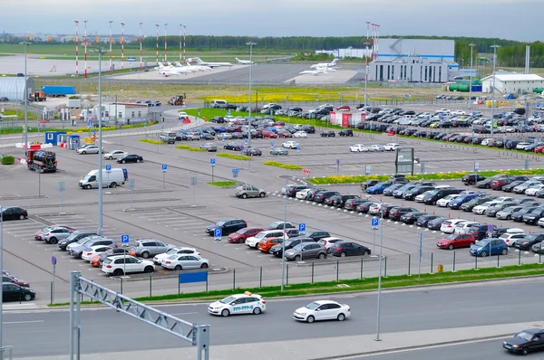 Aerial view of airport auto crowded parking lot in Pulkovo International airport in Saint-Petersburg, Russia