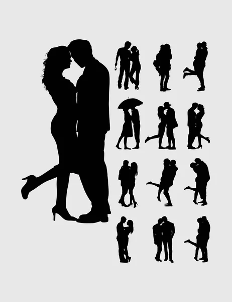 Romantic couples silhouettes — Stock Vector