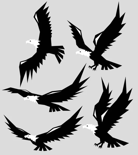 Silhouettes d'aigle polygonales — Image vectorielle