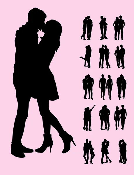 Couple and Kiss Silhouettes — Stock Vector