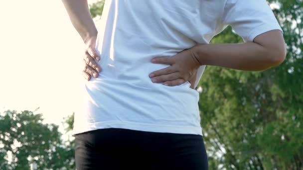 Close Young Woman Touching Her Back Injury Exercise Outdoors Health — Stock Video