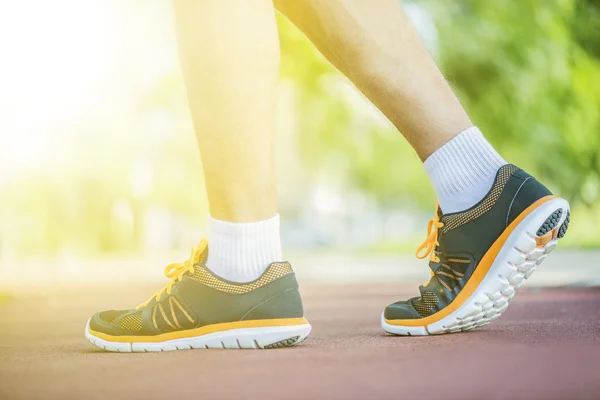 Nära upp skott av runner's skor — Stockfoto