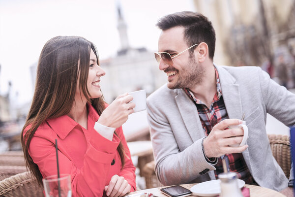 Couple having a cup of coffee on a date