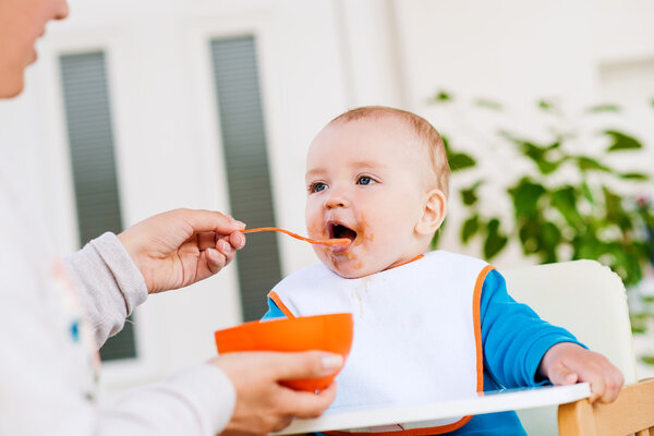 Baby eating at home