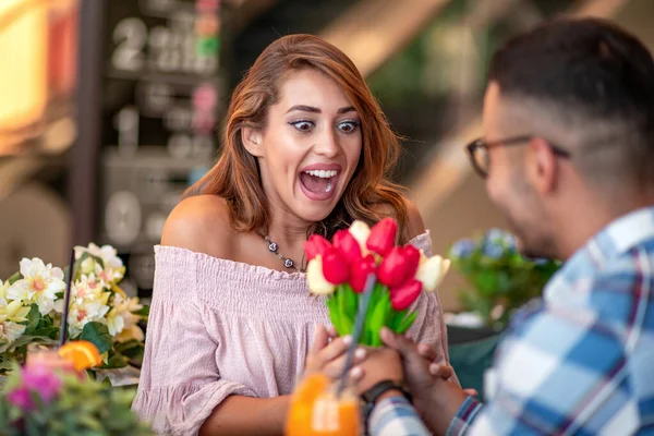 Happy Couple Having Fun Together Cafe Man Gives Woman Bouquet — Stock Photo, Image