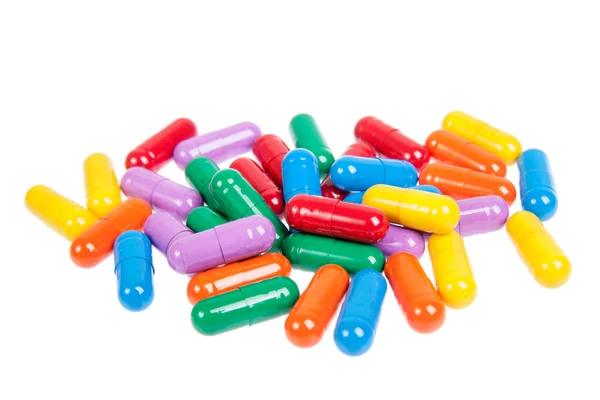 Variety of colorful pills isolated on white — Stock Photo, Image