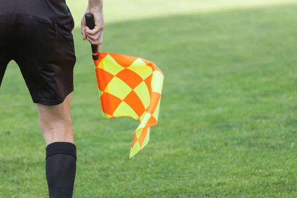 Assistant referees in action during a soccer match — Stock Photo, Image
