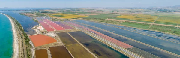 Amazing drone aerial landscape of the beautiful salt ponds, near the beach