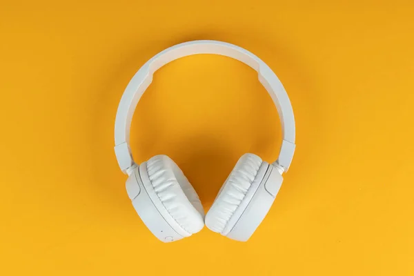 Wireless White Headphones Yellow Background Music Concept Earphones Yellow Background — Stock Photo, Image