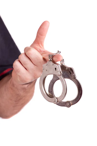 Мужская рука с наручниками изолированы — стоковое фото