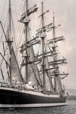Old ship with white sales in black and white clipart