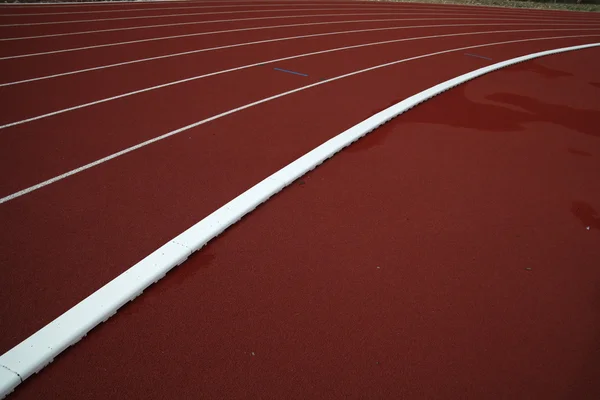 Red running track — Stock Photo, Image