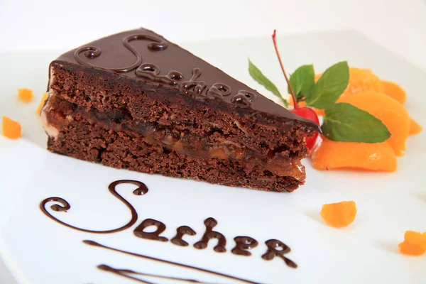Fresh chocolate sacher cake with decoration — Stock Photo, Image