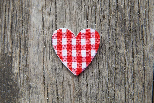 Heart over a wooden background — Stock Photo, Image