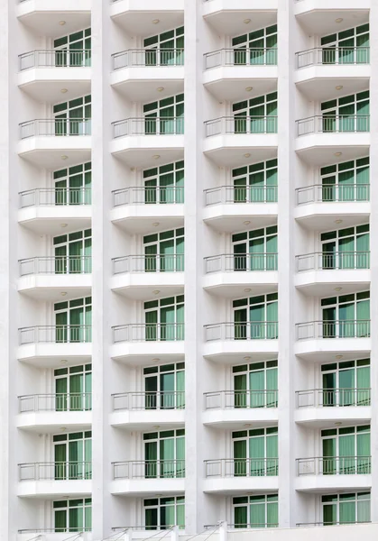 Repeating pattern of windows and balcony. Bulding front — Stock Photo, Image