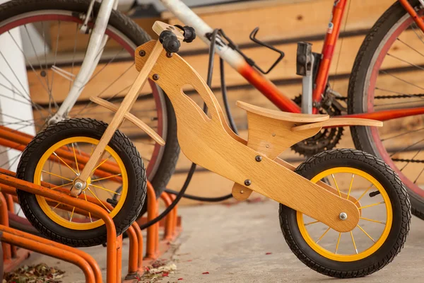 Wooden bicycle at bicycle parking — Stock Photo, Image