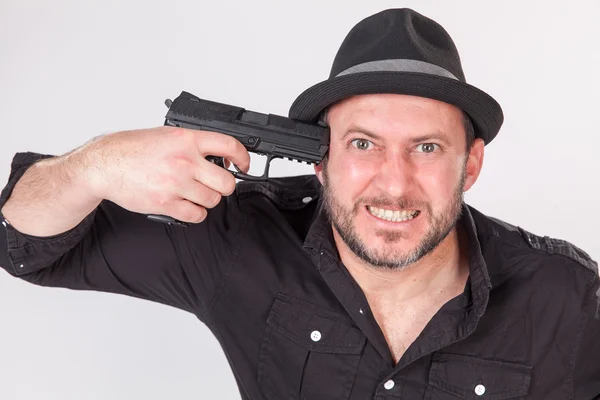 stock photo gun to head from computer stock photo gun to head from computer