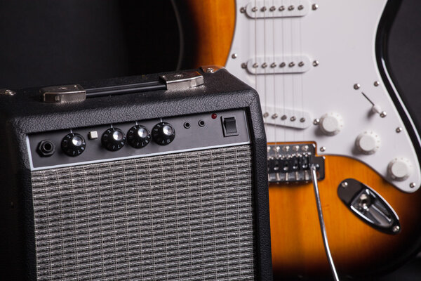 Amplifier and electric guitar