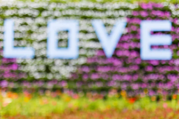 birçok renk arka plan üzerinde kelime aşk stiliyle bulanıklık 